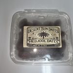 2 lb sealed container of jumbo Medjool dates with the Desert Sun Dates label